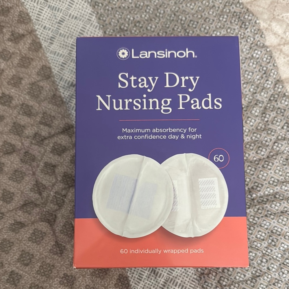 Lansinoh Stay Dry Nursing Pads - Purple and Orange Box